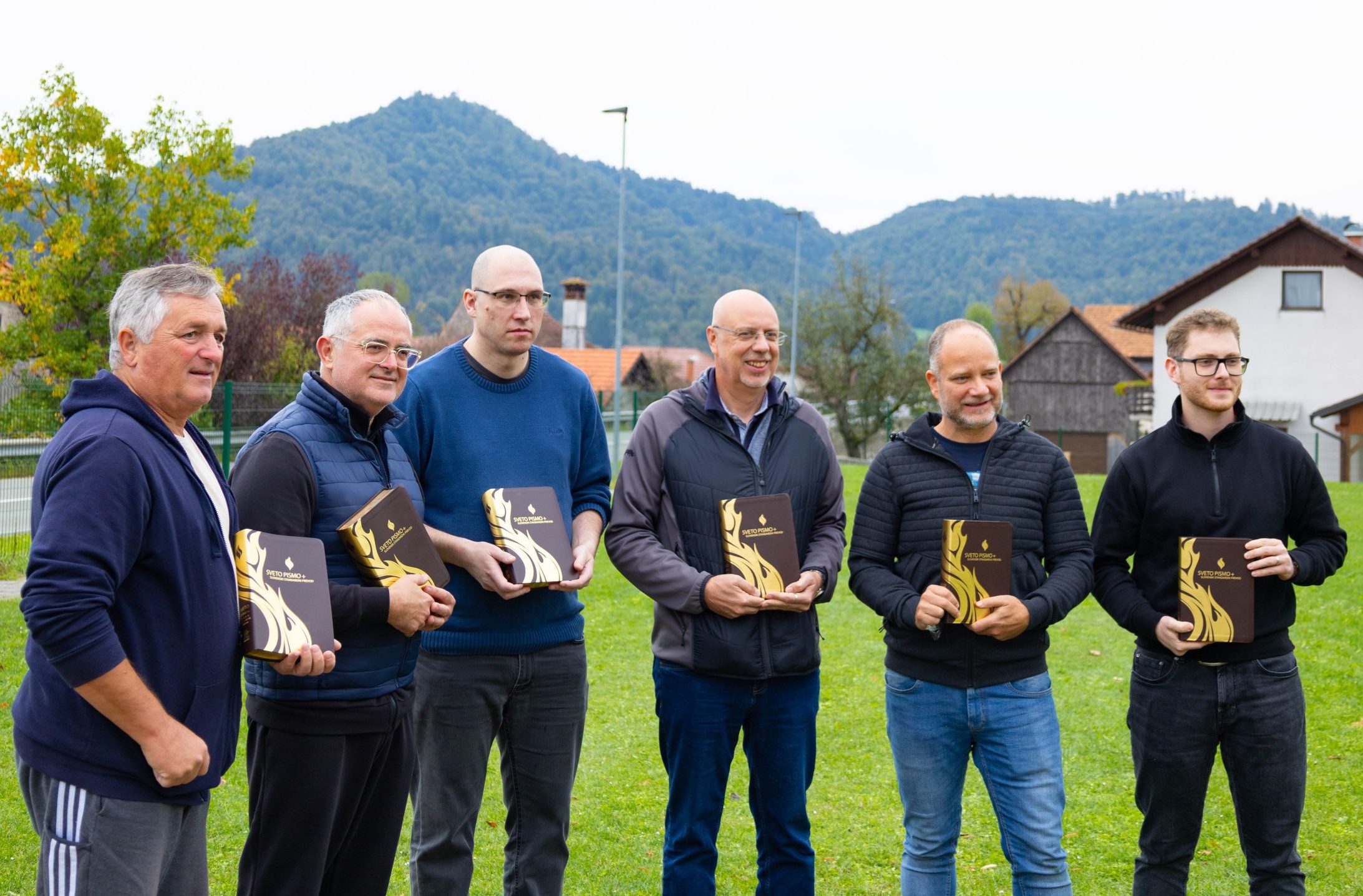 Slovenian Men showing their Fire Bibles